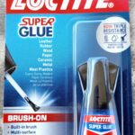 Loctite Super Glue with brush-on applicator in packaging.