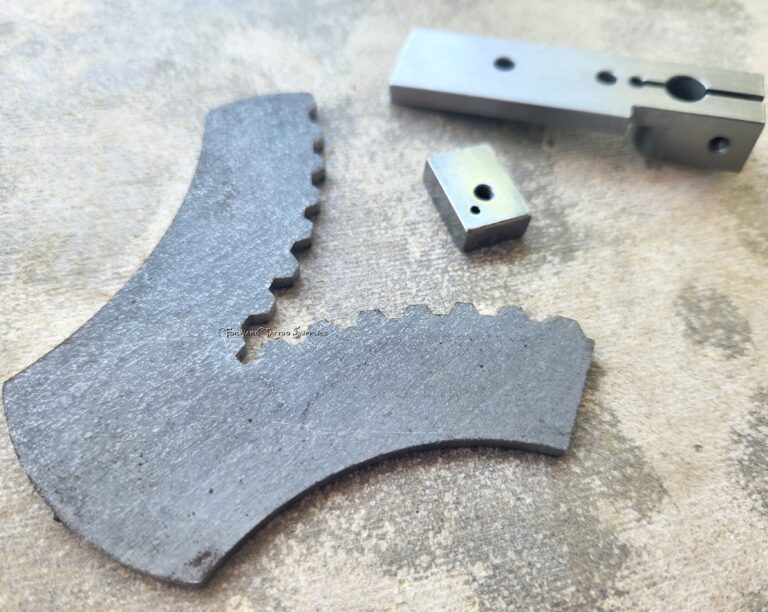 Metal components on a textured surface.