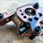 Worn copper tattoo machine coil detail