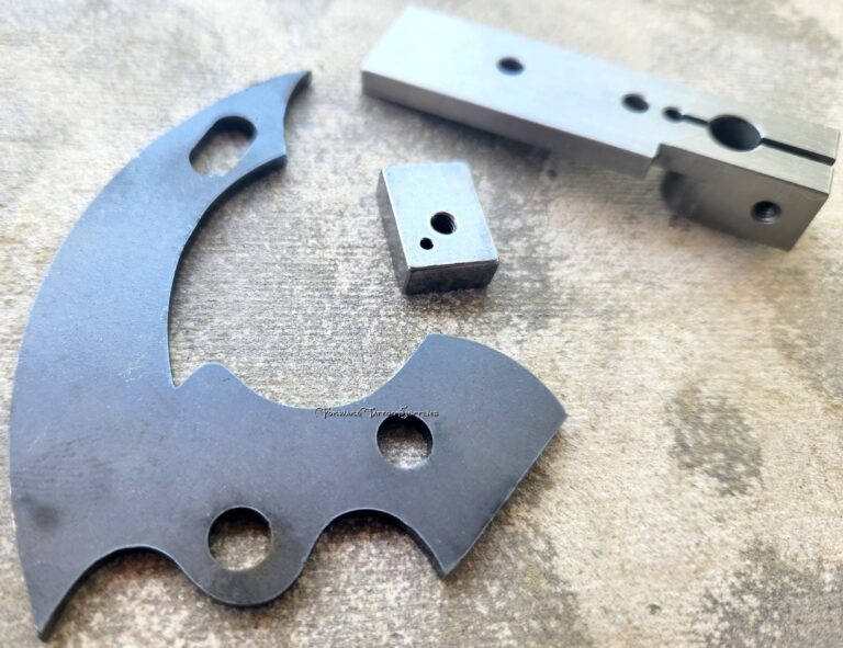 Metal components on a textured surface.