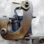 Bronze frame and armature contact
