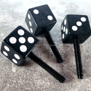 Three screws with dice-shaped heads showing various numbers.