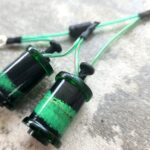 Green coil wires and black rubber stops