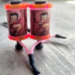 Two tattoo coils with pink tubing