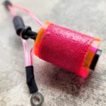 Close-up of pink tattoo coil