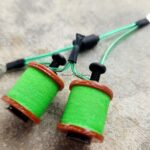 Bright green wrapped coil with leather rims
