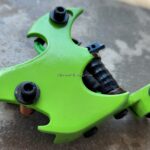 Lime green tattoo machine frame with screws