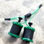 Green tattoo machine grips with wires