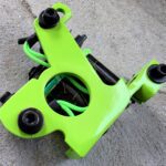 Vibrant green tattoo machine design